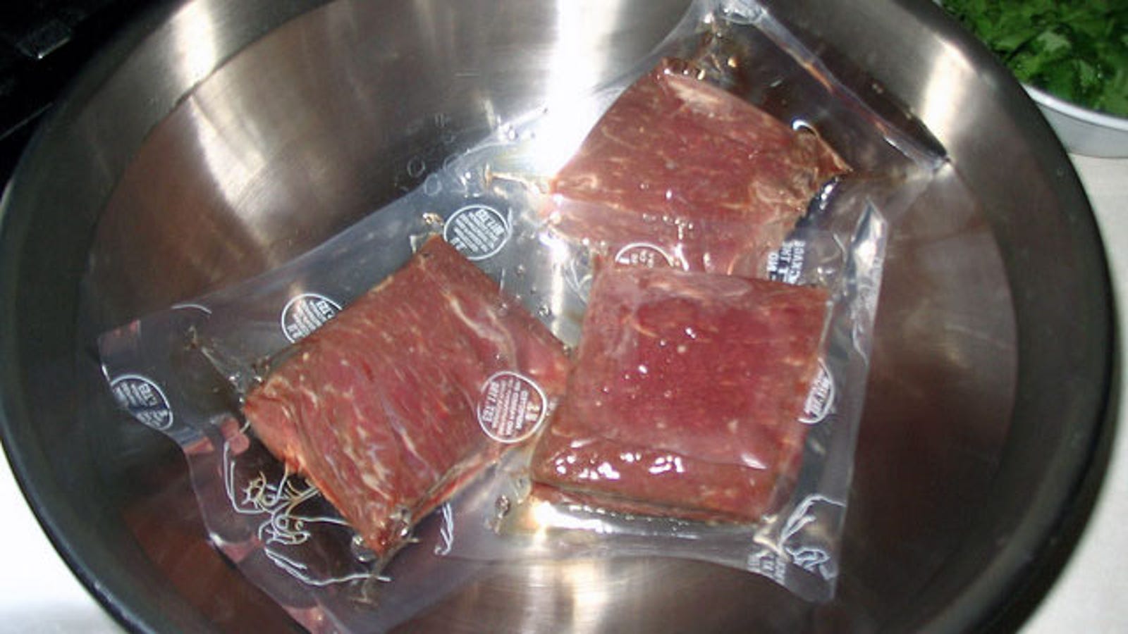 Does meat thaw faster in cold water or hot water? - Foodly