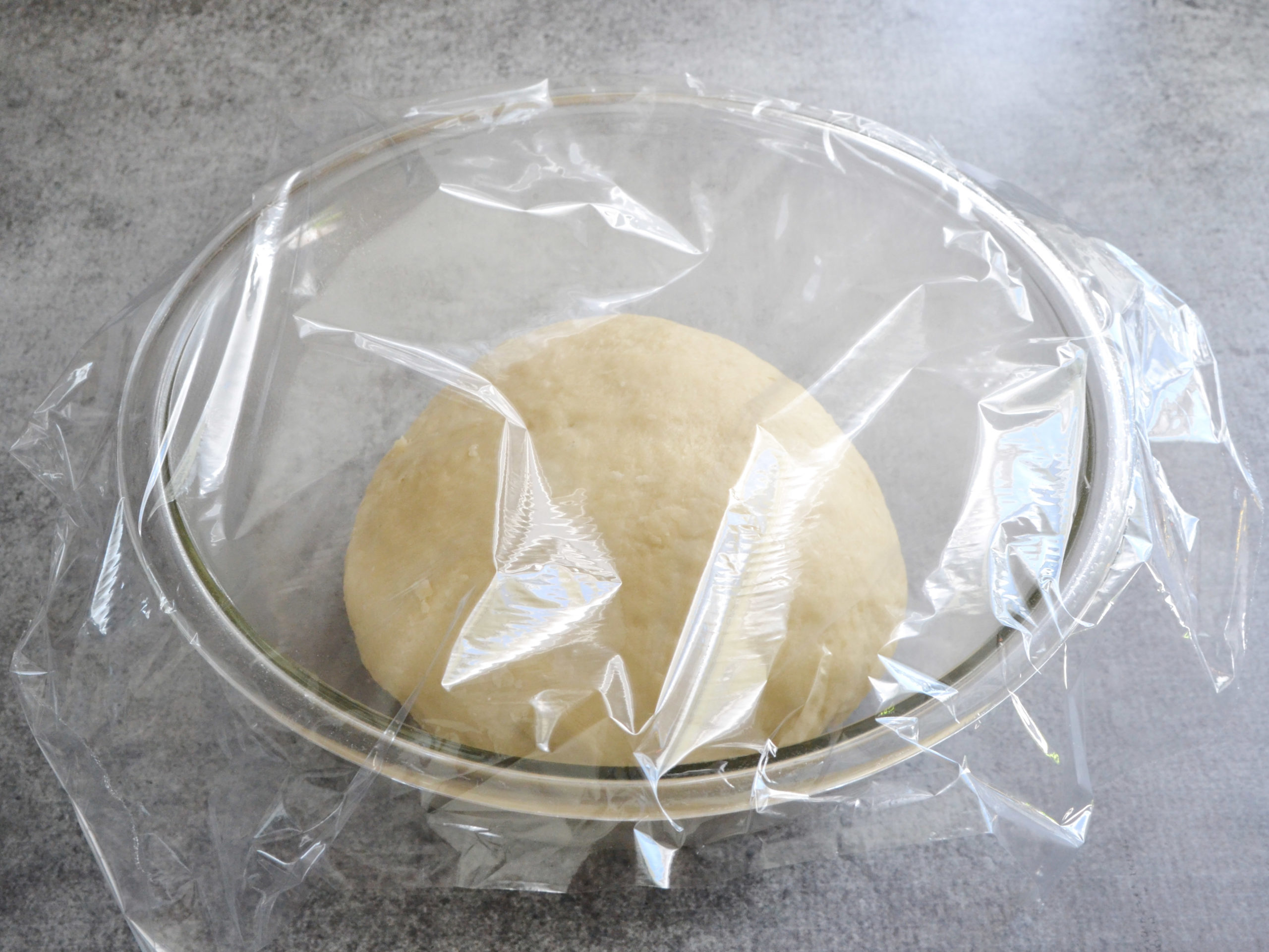 Where is a good warm place to let dough rise?