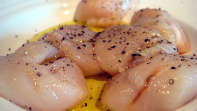 Are undercooked scallops dangerous?