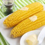 Can corn on the cob be cooked ahead of time?