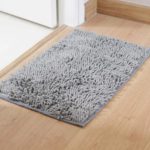 Can rubber-backed rugs go in the dryer?