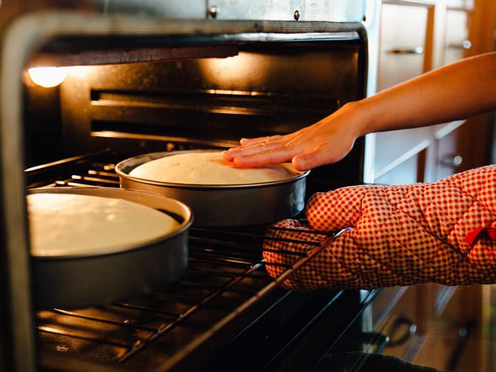 Can you bake a cake with other things in the oven?