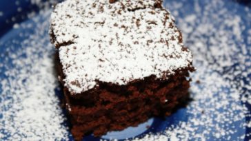 Can you put 2 cake mixes in 9x13 pan?