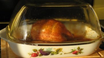 Do I put water in the bottom of a roaster for turkey?