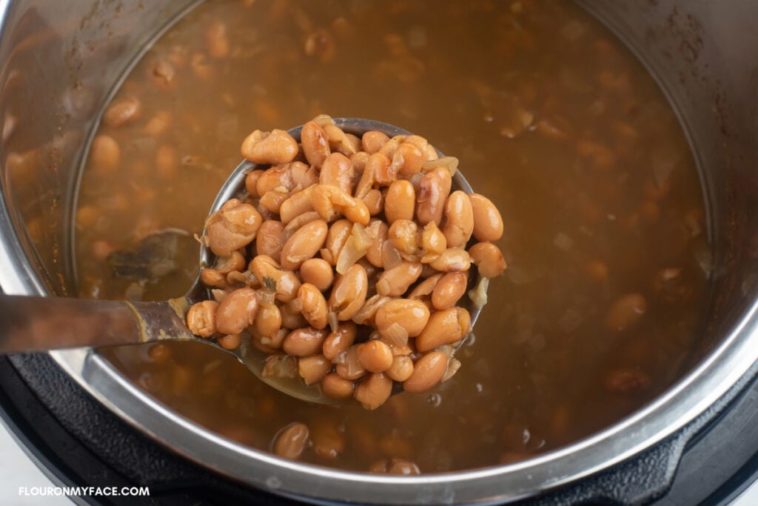 Do pinto beans turn white while cooking?