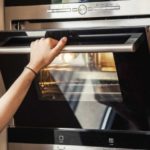 Do you close the oven door when using the grill?