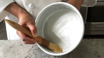Do you grease bread machine pan?