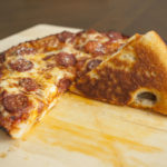 Do you grease pan for homemade pizza?