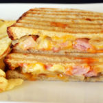 Do you put butter on a panini press?