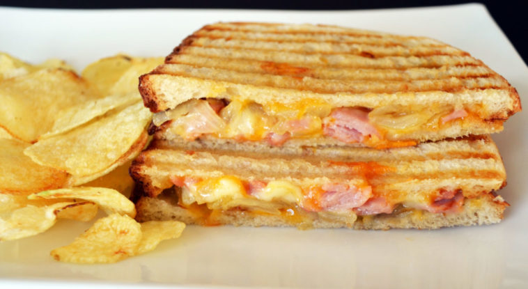 Do you put butter on a panini press?