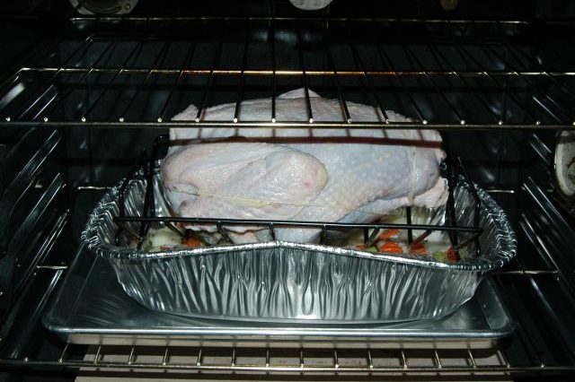 Do you put water in the pan when cooking a pork roast?