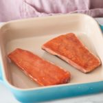 Do you wash frozen salmon before cooking?