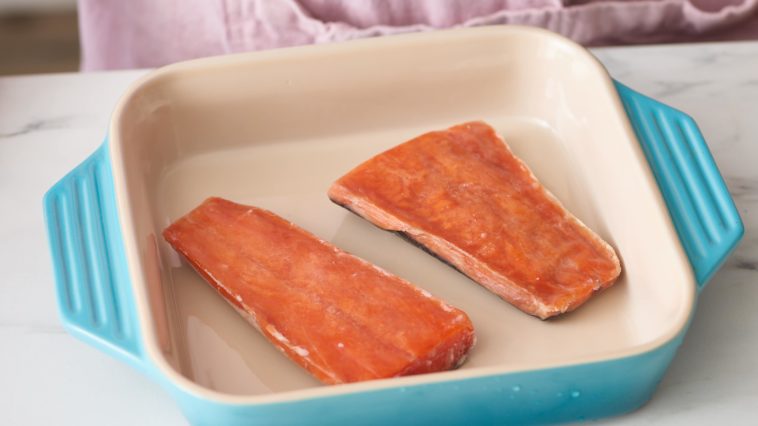 Do you wash frozen salmon before cooking?