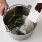 Does adding salt to water lower the boiling point?