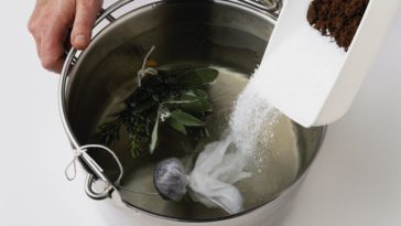 Does adding salt to water lower the boiling point?