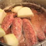 Does boiling brats in beer add flavor?