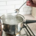 Does salt in water make it boil faster?