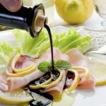 Does vinegar eat oil?