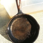 Does vinegar harm cast iron?