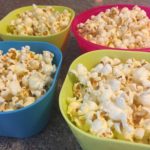 How can I add butter to popcorn without making it soggy?
