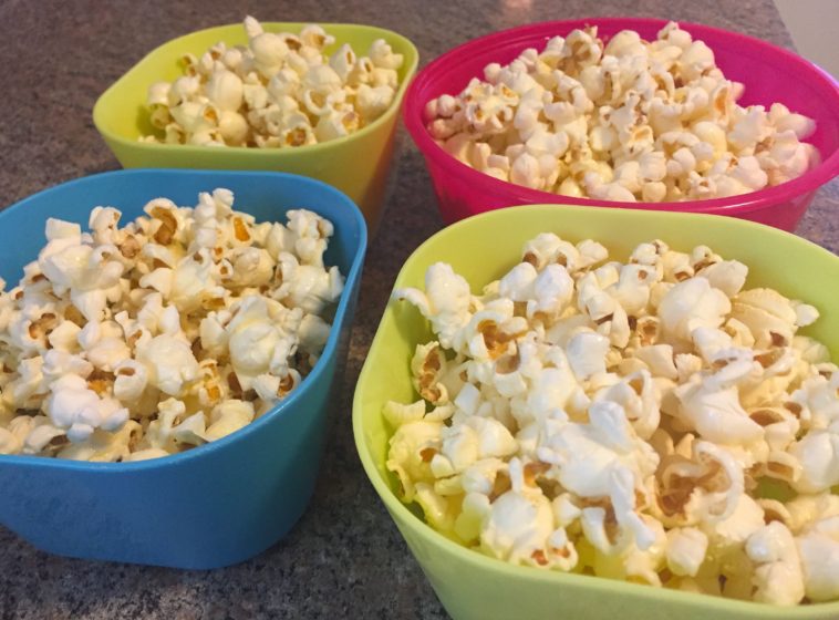 How can I add butter to popcorn without making it soggy?