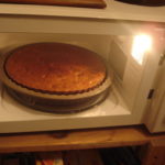 How can I bake a cake in the microwave without a convection oven?