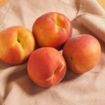 How can you tell if peaches are ripe?