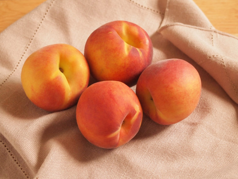 How can you tell if peaches are ripe?