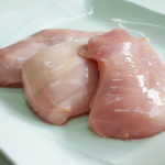 How can you tell if raw chicken is spoiled?