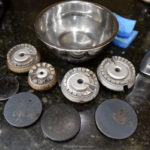 How do I clean an old gas stove burner?