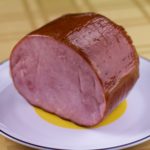 How do I cook a precooked ham?