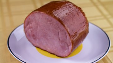 How do I cook a precooked ham?