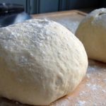 How do I cook frozen pizza dough?