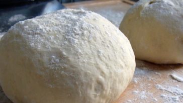 How do I cook frozen pizza dough?