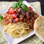 How do I make premade spaghetti sauce better?