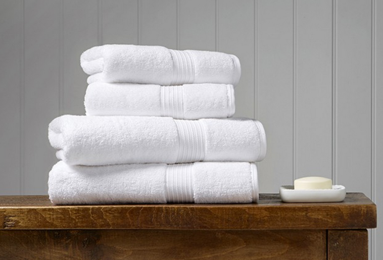 How do hotels keep their towels so white and soft?