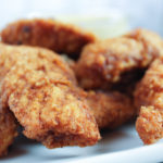 How do restaurants make chicken so tender?