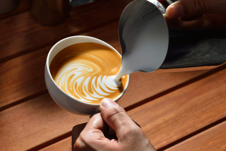 How do you add flavor to a latte?