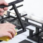 How do you clean and sanitize a gas burner?