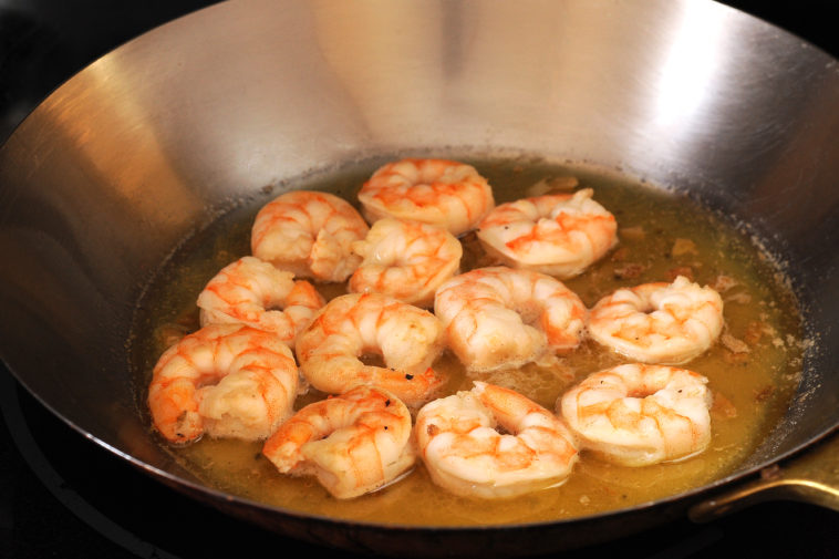 How do you cook already cooked frozen shrimp?
