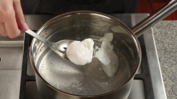 How do you crack an egg for poaching?