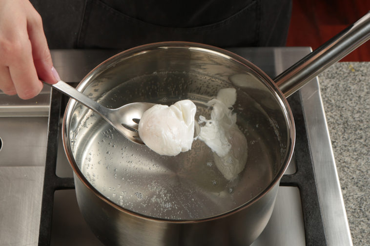How do you crack an egg for poaching?