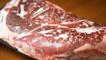 How do you defrost a beef roast in the microwave?