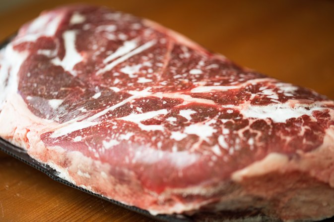 How do you defrost a beef roast in the microwave?