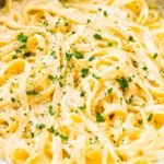 How do you dress up Alfredo sauce?