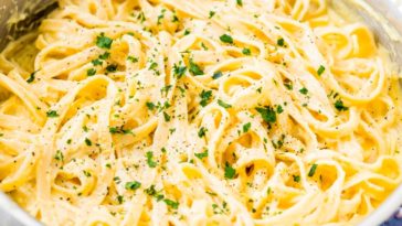 How do you dress up Alfredo sauce?