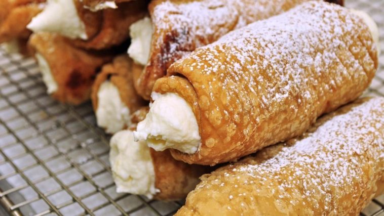 How do you eat a cannoli?