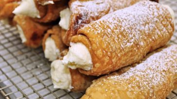 How do you eat a cannoli?
