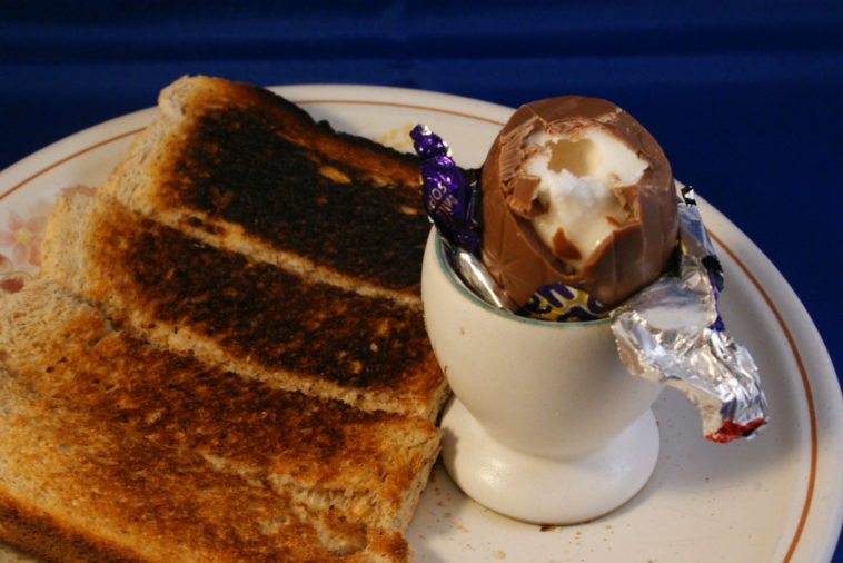 How do you eat an egg in an egg cup?