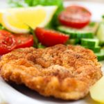 How do you eat schnitzel?